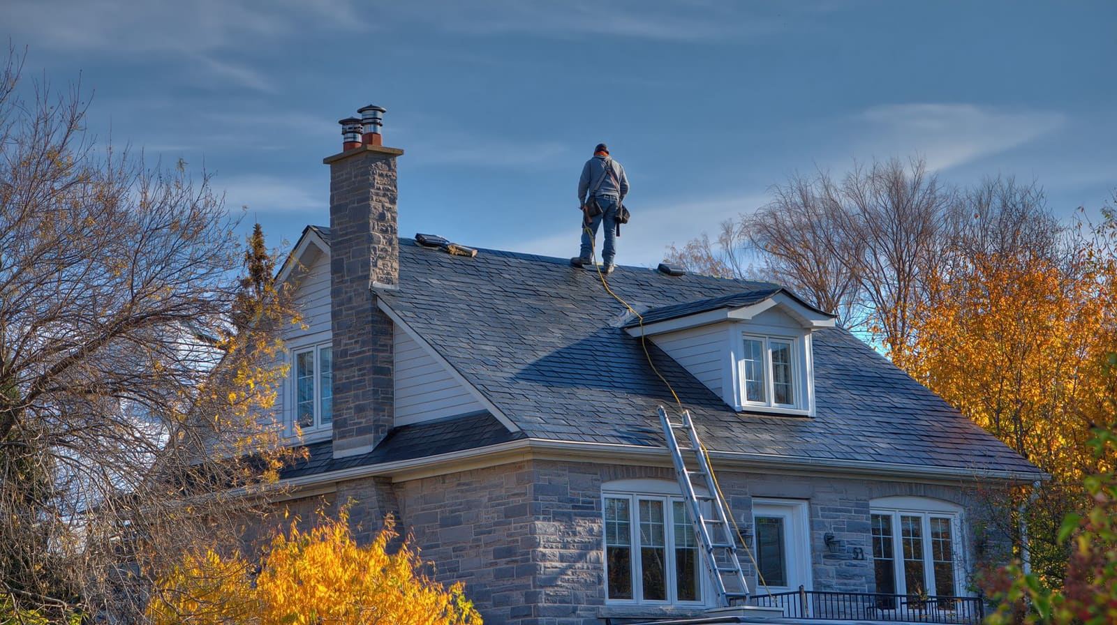 A long roofline in soft evening light